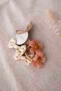 Set van 4 haarelastieken met bloem / strik