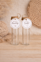 Set van twee glazen bewaarflesjes - "Mijn eerste haarlokje" & "Mijn eerste tandjes"